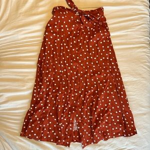 Polka dot mid length skirt with front button-down detail